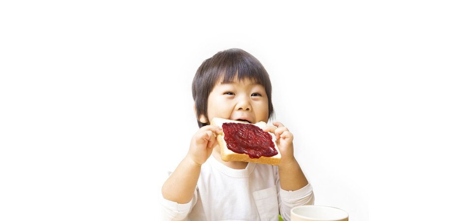 Banner-Image-Kid eating Bread.jpg